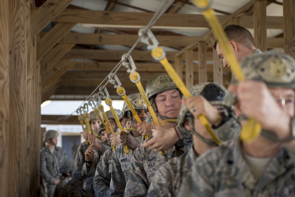 Members of the 82 Airborne Division conduct pre-jump rehearsals.