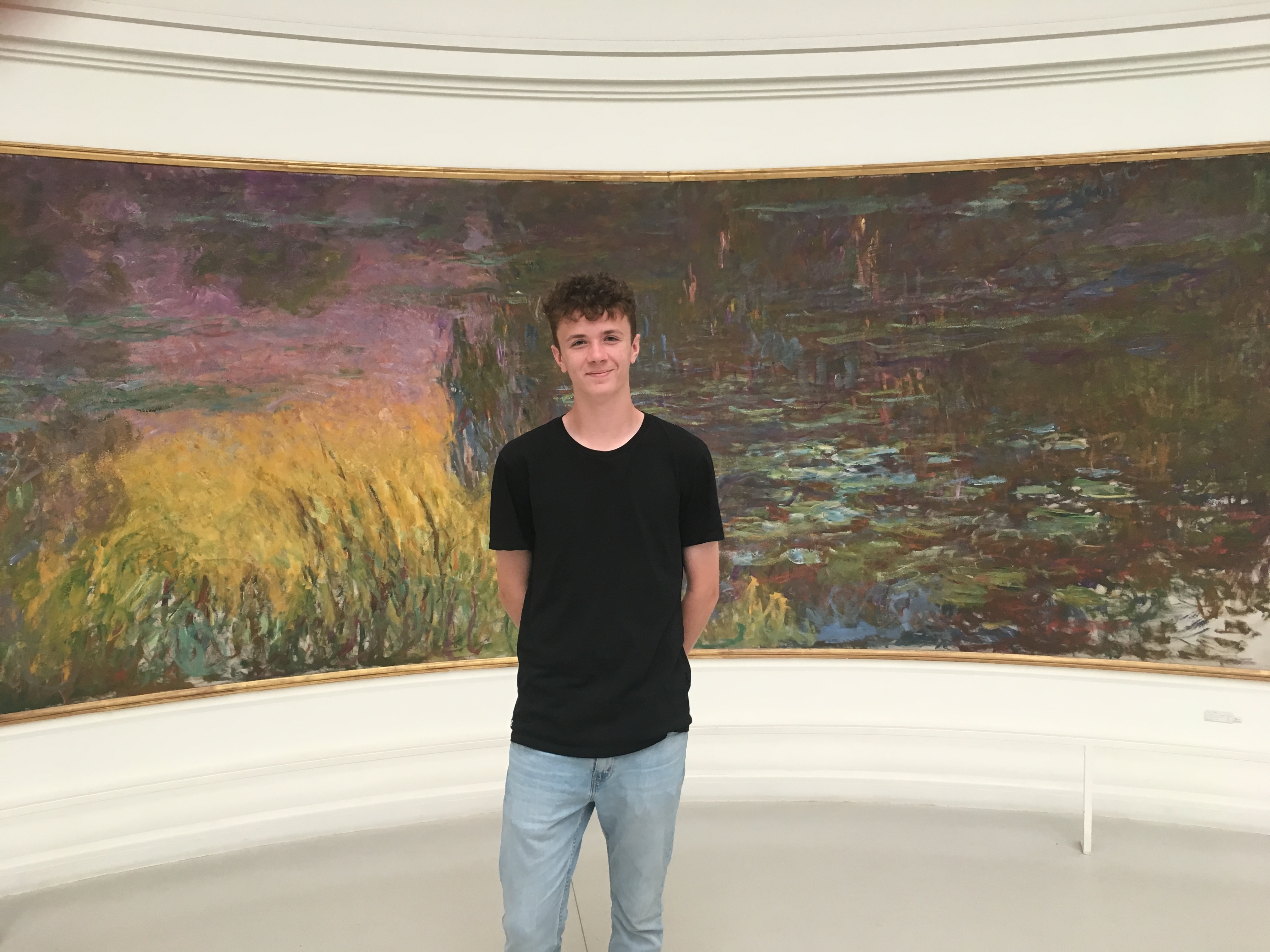 Riley in front of Monet painting